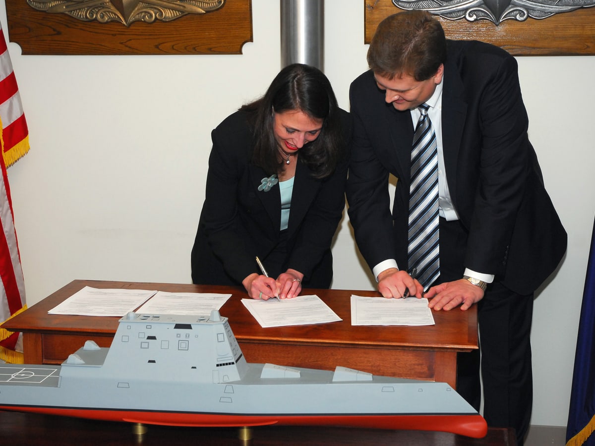 A real government contract signing ceremony at the Pentagon.