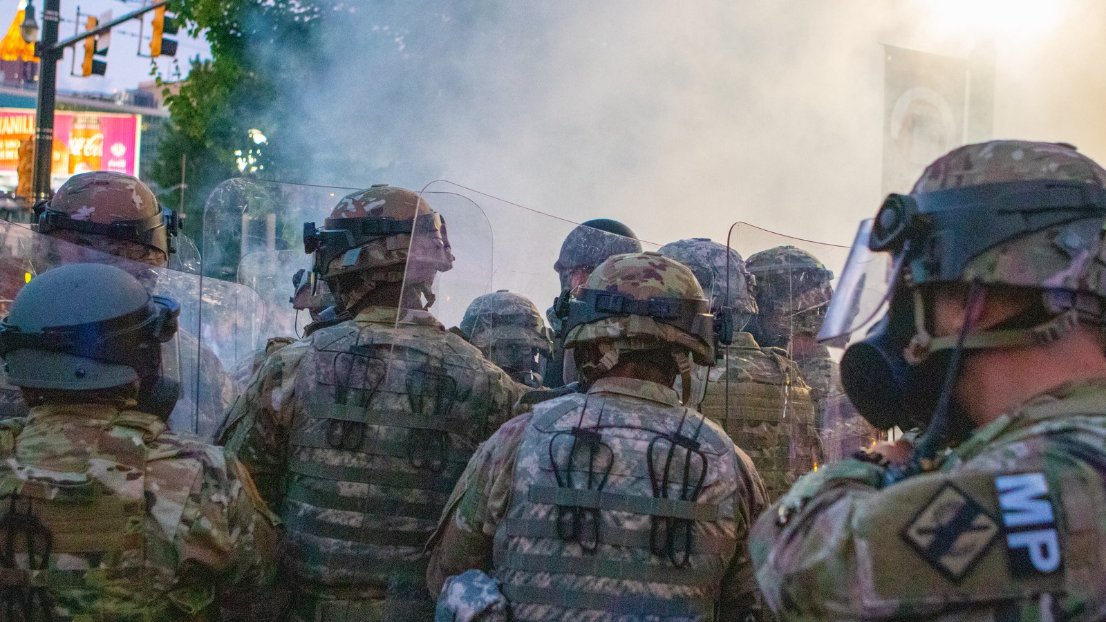 Georgia Army National Guard soldiers form a police line at Centennial Olympic Park in Atlanta during protest demonstrations on May 31, 2020.