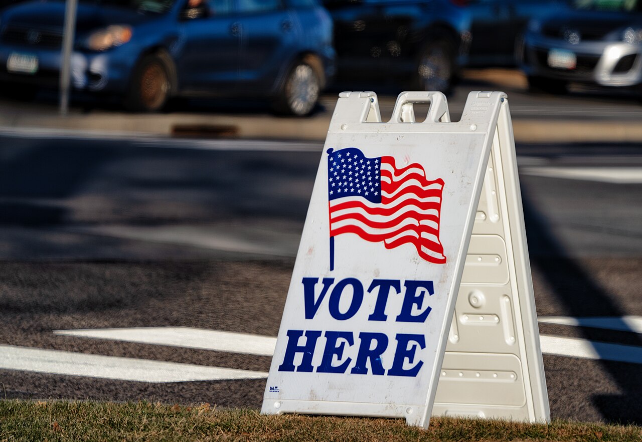 A real Vote Here sign outside an election polling place at Woodbury City Hall in Minnesota during the 2020 general election.